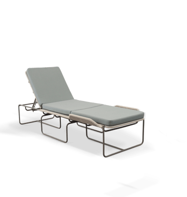 a hospital bed with a chair and a chair