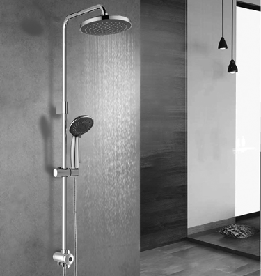 Modern chrome rainfall shower head with handheld sprayer system mounted on a grey bathroom wall.