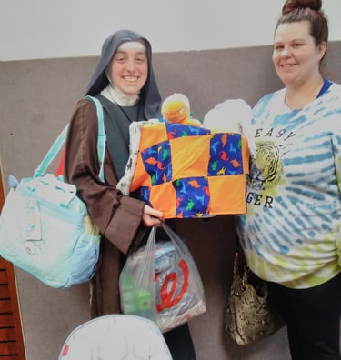 A mom receiving free help from the Rose Garden