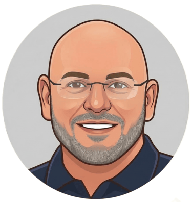 Professional digital portrait of a smiling bald man with a grey beard and glasses.