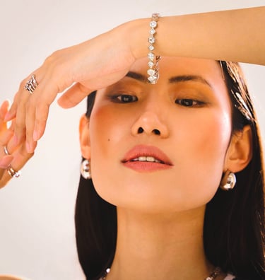 BONHEUR JEWELRY silver hexagon link bracelet, matching rings, and hoop earrings.