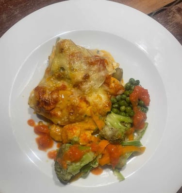 a plate of food with broccoli and vegetables