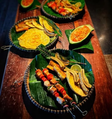 a table with a variety of food items on itNosy Be