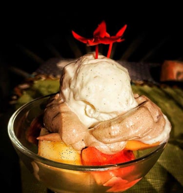 a bowl of fruit and ice cream in a bowl Nosy Be