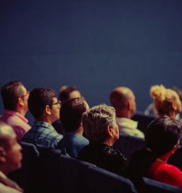 A Group of People Attending a Corporate Conference 