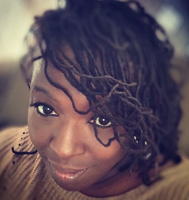 Picture of the founder and CEO locking directly into the lens of the camera