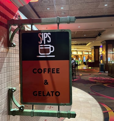 sign with coffee cup for Sips coffee & gelato in reno, nv