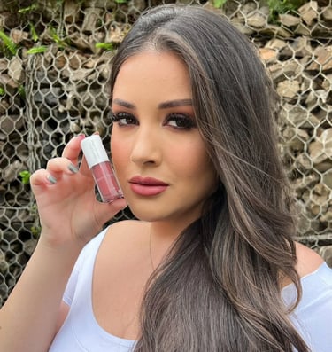 a woman with long hair and a white shirt