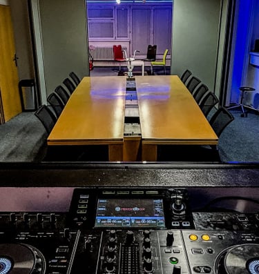 Group DJ course classroom with mixing setup at Prague DJ Society