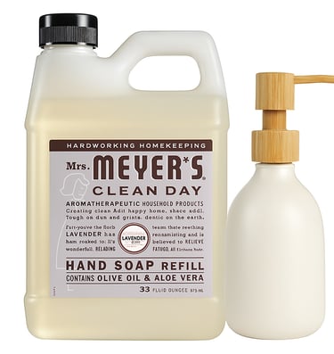 Mrs. Meyer’s Clean Day lavender hand soap refill bottle with cream ceramic dispenser