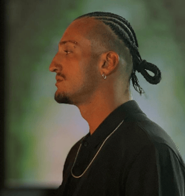 a man with a mohawkcut and a mohawkcut