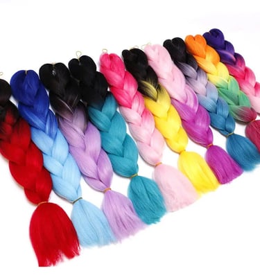 a bunch of colored braids on a white background