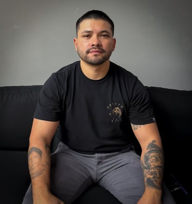 Junior, tattoo artist at Royal Nine Tattoo in Dallas, TX, focused on a custom cover-up tat