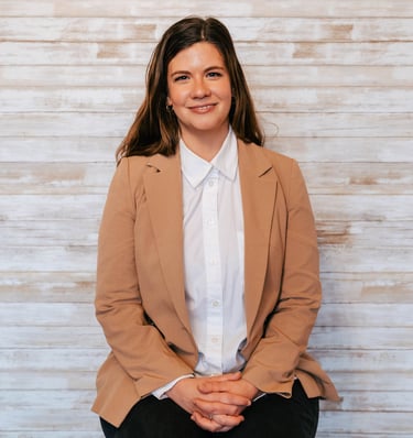 Ariel Weber a social worker and psychotherapist who performs CBT, DBT and ACT smiling 