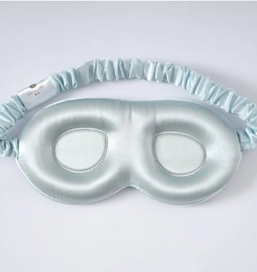 Contoured mulberry silk sleep mask designed to block light without eye pressure