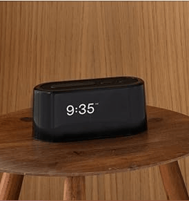 Black Loftie smart alarm clock with digital display.