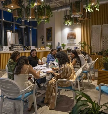 a group of people sitting at a table