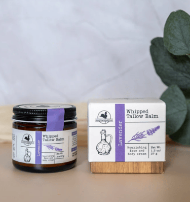 Hearth and Homestead Lavender Whipped Tallow Balm in a glass jar.
