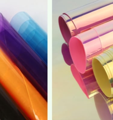 Rolls of clear and colorful PVC, EVA, and TPU materials, waterproof and modern.