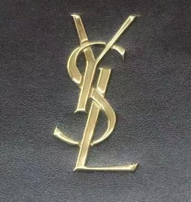 A sleek and luxurious raised TPU logo, expertly applied on a premium leather surface.