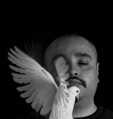 a man with a mustache and mustaches is holding a white bird