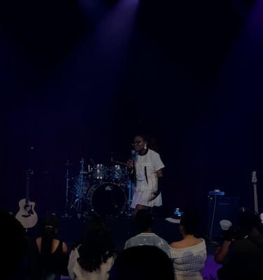 Iheoma Uzomba Oma is Loud performing poetry at Palace Theatre, Calgary Concert