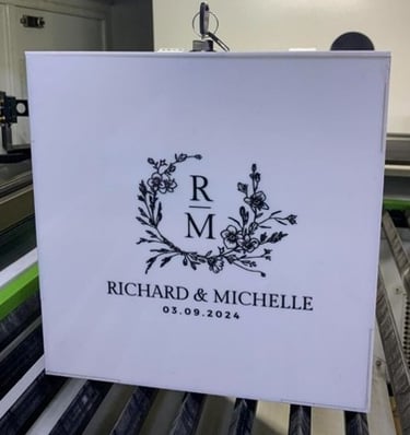 White acrylic wedding box with floral initials and 'Richard & Michelle 03.09.2024