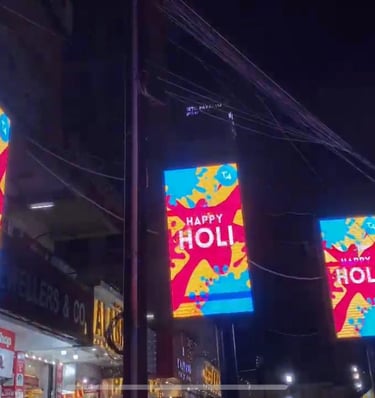 a group of banners hanging from a pole