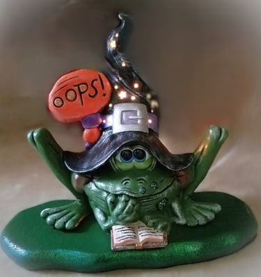 A witch turned into a frog with a lighted hat.
