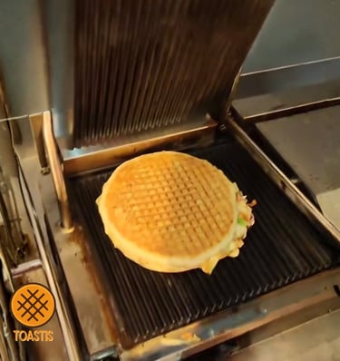 a waffle sandwich sandwich on a grill grill Toastis Toastup