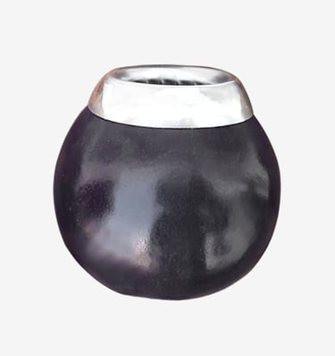 Handcrafted black ceramic yerba mate gourd cup with a polished silver rim