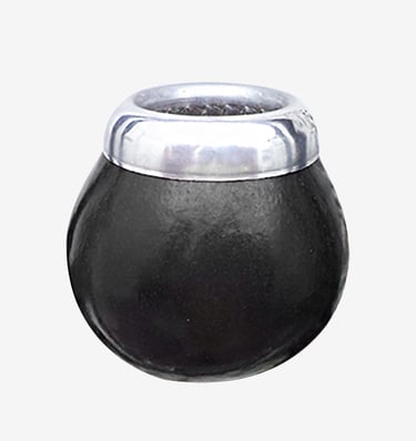 Black ceramic yerba mate gourd with a polished silver rim isolated on a white background.