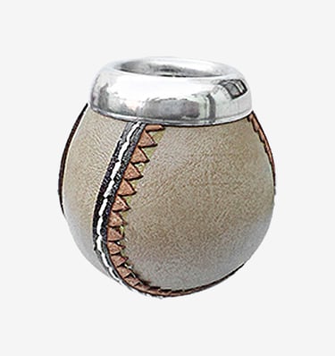 Handcrafted leather yerba mate gourd cup with decorative stitching and silver metal rim.