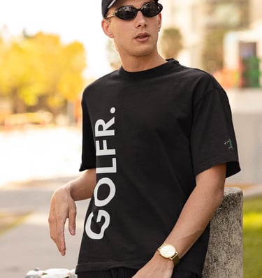 a man in a black shirt and sunglasses