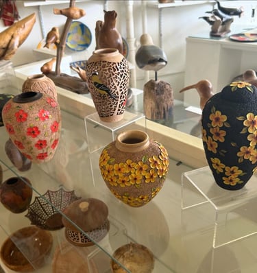 a selection of hand carved vessels