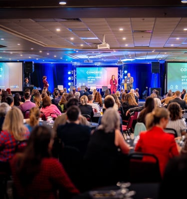 Audience at the Hotellerie et Spa 2025 conference watching speakers on stage during a professional hospitality industry