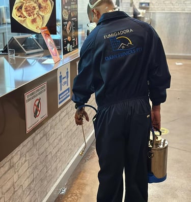 a man in a uniform is standing in front of a counter