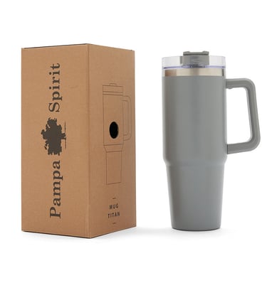 Gray Titan insulated travel mug with handle and lid next to its Pampa Spirit branded cardboard box.