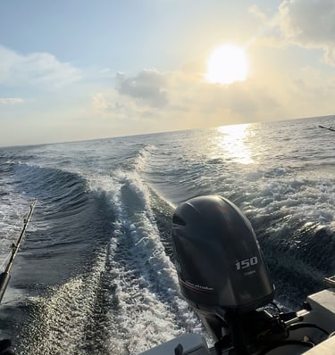 a boat with a fishing rod and a fishing rod