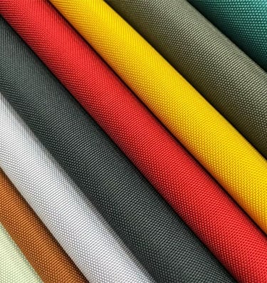 A selection of colorful RPET fabrics, a sustainable material option by King Fly.
