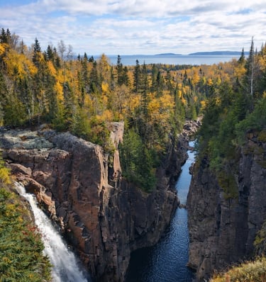 Northern Ontario in the fall overlooking a stream and a waterfall