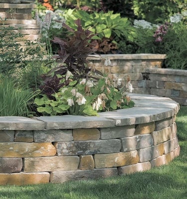 a stone wall with a stone wall and a stone wall