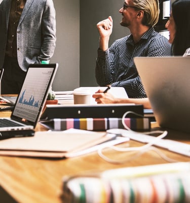 group of people in a business meeting representing gold ira for small businesses