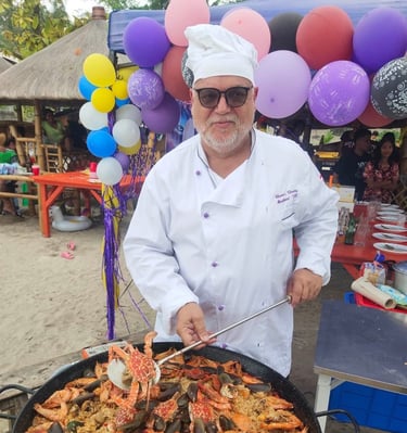 Austrian Chef serving his Paella during a party