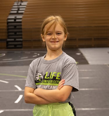 female wrestler smiling