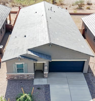 a house with a garage door and a garage door