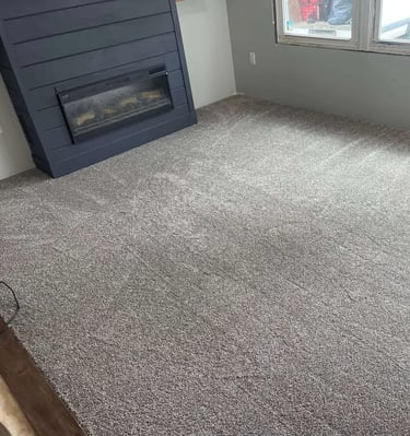 Cozy bedroom with soft grey plush carpet installed by Master Carpet, enhancing comfort and style in London, Ontario homes
