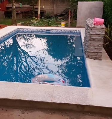 a pool with a pool and a pool in the background