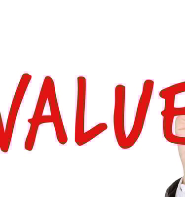 hand writing the word "values" with a marker symbolizing augusta precious metals blog post about their values