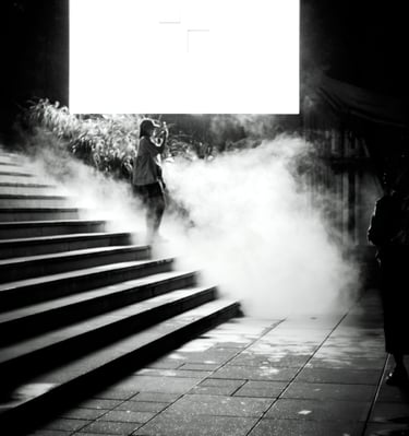 a person standing on a set of stairs